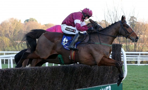 Bryan Cooper onboard Don Poli clears the last fence on his way to winning