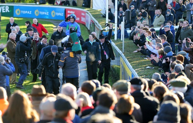 Ruby Walsh and Hurricane Fly are lead into the parade ring after winning