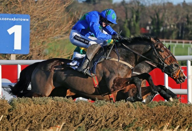 Ruby Walsh onboard Hurricane Fly clears the last hurdle