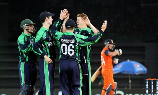 Kevin O'Brien is congratulated by teammates after taking a wicket