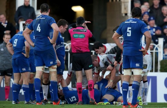 Marius Mitrea signals for the TMO before Ulster were awarded their first try