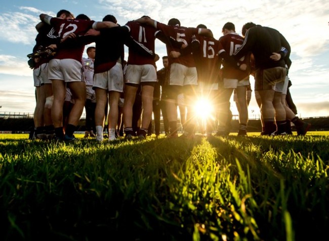 The NUIG team huddle after the game