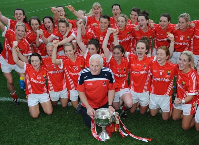 The Cork team and Eamonn Ryan with the cup after the game