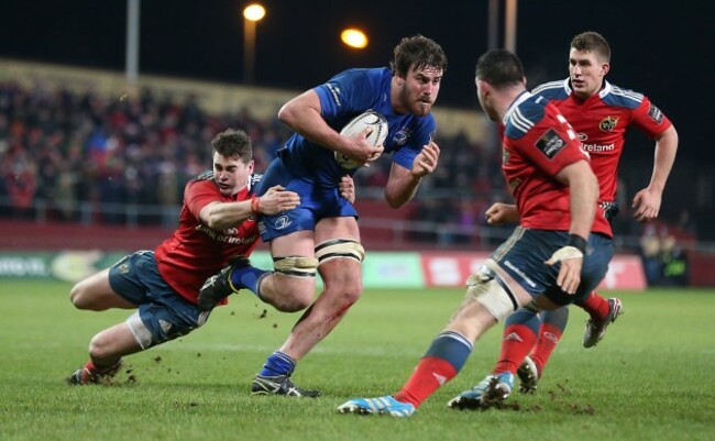 Leinster&Otilde;s Kane Douglas is tackled byMunster&Otilde;s Ian Keatley  26/12//2014