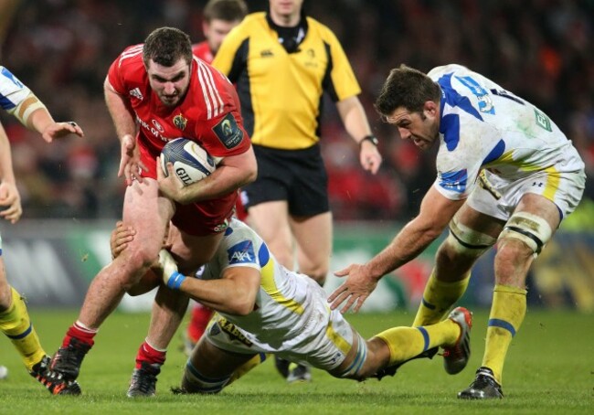 James Cronin is tackled by Damien Chouly and Jamie Cudmore