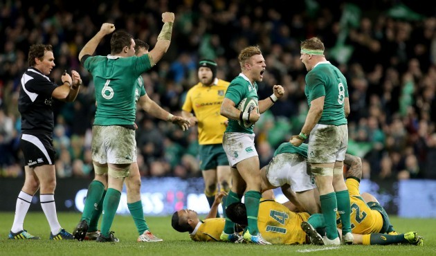 Ian Madigan and Jamie Heaslip celebrate winning a late penalty to end the game