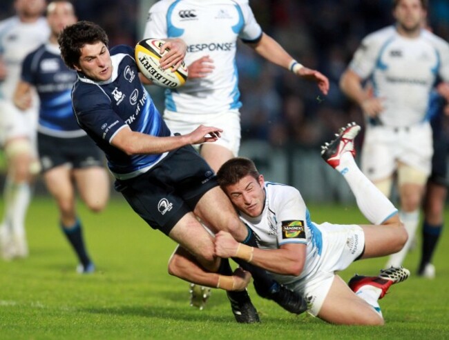 Ian McKinley tackled by DTH van der Merwe