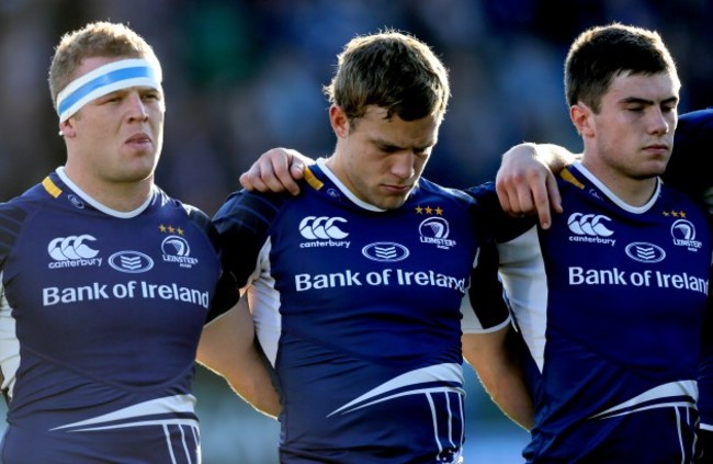 Tom Sexton, Ian Madigan and Luke McGrath observes a minutes silence