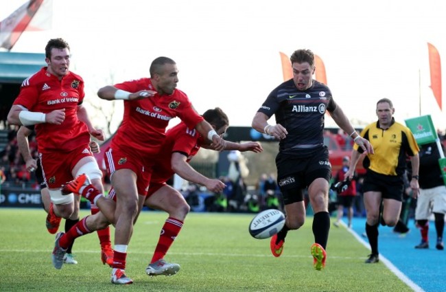 Simon Zebo and Felix Jones tackle Chris Wyles of as he kicks the ball through for Chris Ashton to score a try