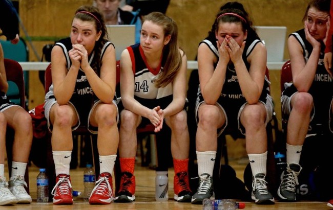 Saint Vincents Cork players dejected at the end of the game