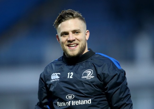 Ian Madigan warms up before the game