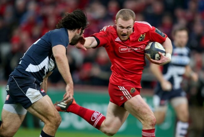 Keith Earls hands off Luke McLean to run in for a try