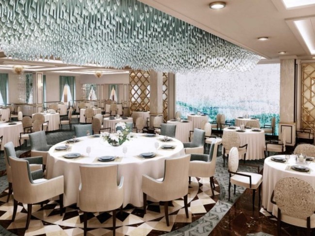 the-explorer-will-host-a-myriad-of-dining-options-starting-with-the-main-dining-room-the-compass-rose-all-seven-seas-ships-have-a-rose-dining-room-but-this-one-sports-a-modern-new-look-featuring-a-huge-cascading-blue-chandelier