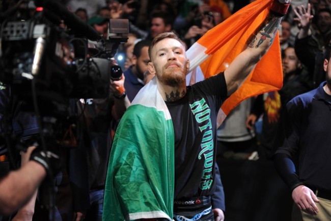 Conor McGregor makes his way to the octagon