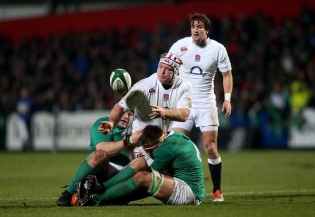 Mike Ross and Dominic Ryan tackle Thomas Waldrom