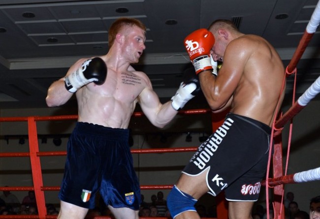 Steve Collings Jnr attempts to land some punches on Moses Matuvu 12/7/2013