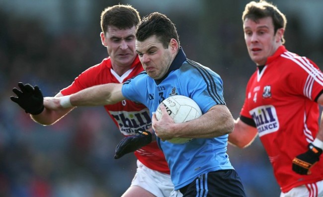 Kevin McManamon with Fintan Goold and James Loughrey