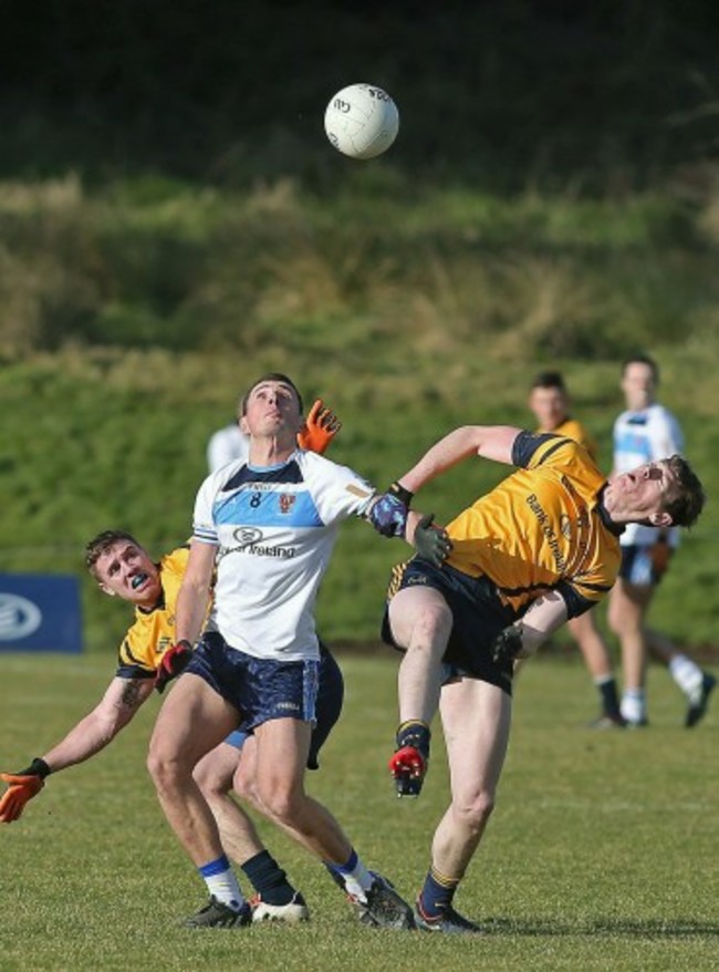 Stephen Sheridan jumps with Davey Byrne and Tom Flynn