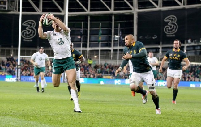 Tommy Bowe scores their second try despite Bryan Habana