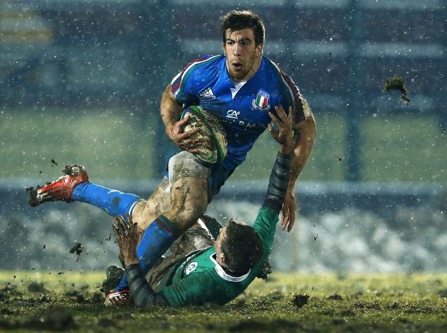 Enrico Lucchin tackled by Nick McCarthy