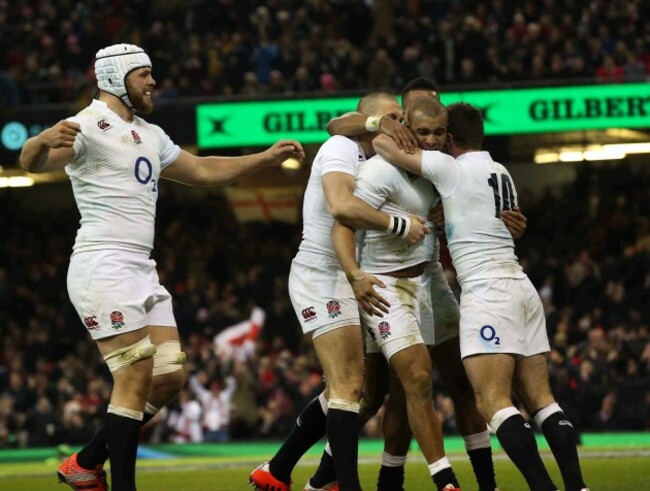 Jonathan Joseph celebrates scoring his side's second try with teammates