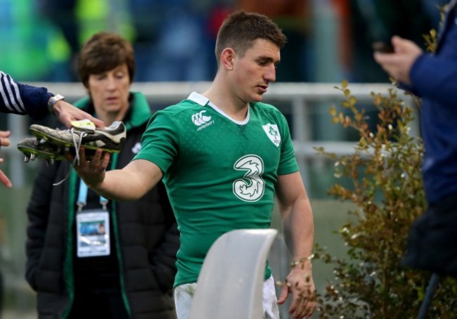 Ian Keatley gives away his boots after the game