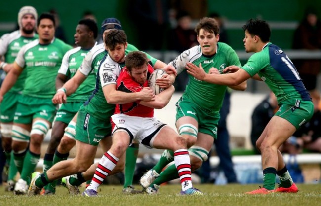 Conor Finn, Jake Heenan and Rory Parata tackle Ross Adair