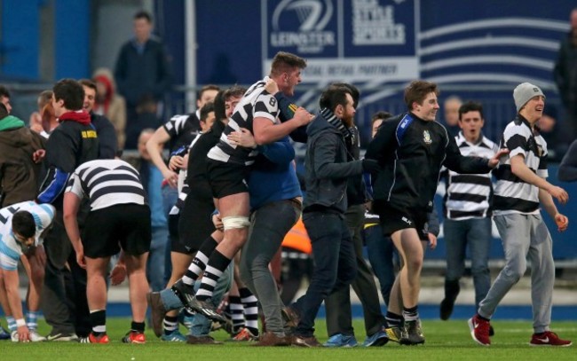 Dan Trayers celebrates with fans after the game