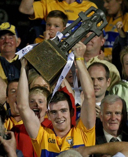 Tony Kelly lifts the trophy