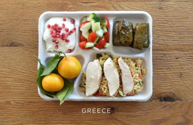 greece-baked-chicken-over-orzo-stuffed-grape-leaves-tomato-and-cucumber-salad-fresh-oranges-yogurt-with-pomegranate-seeds