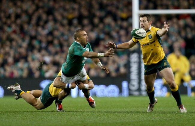 Bernard Foley stops Simon Zebo's offload to Jonathan Sexton as he is tackled by Matt Toomua