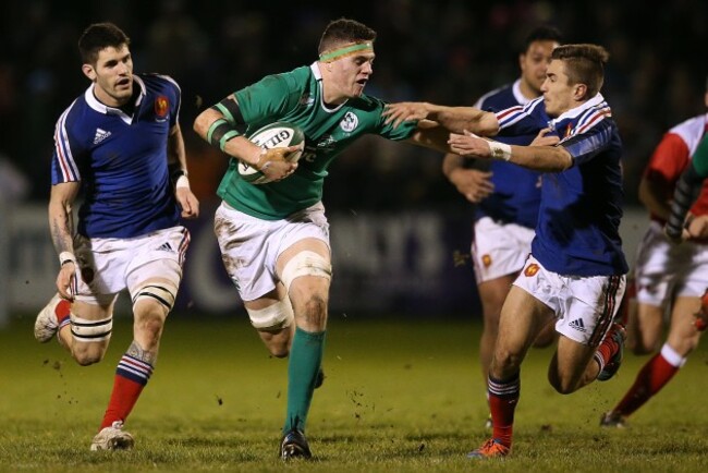 Fabien Sanconnie and Anthony Meric tackle Josh Murphy