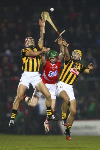 Daniel Kearney attempts to gather possession under pressure from Cillian Buckley and Geoff Brennan