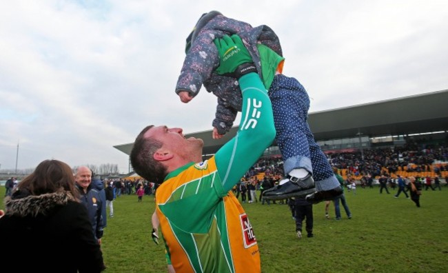 Gary Delaney celebrates with his daughter Kaya at the end of the game