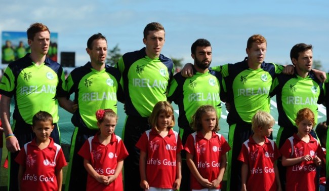 The Ireland team stand for the National Anthem t