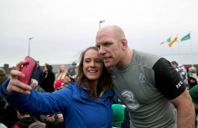 Paul O'Connell poses for pictures with fans