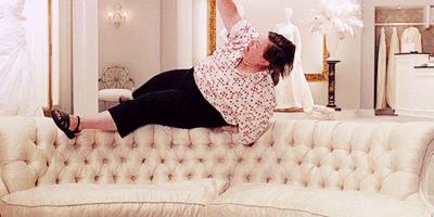 Melissa-McCarthy-falling-face-down-on-a-couch-in-Bridesmaids-GIF