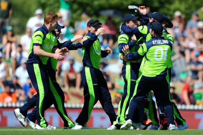 Ireland player celebrate the wicket of Chris Gayle