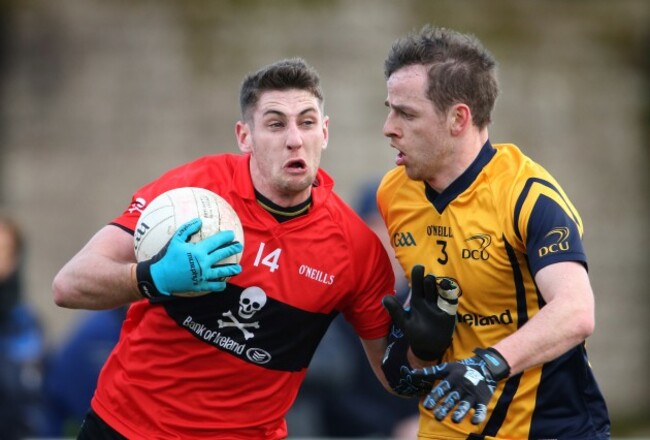 Paul Geaney is tackled by Conor Boyle