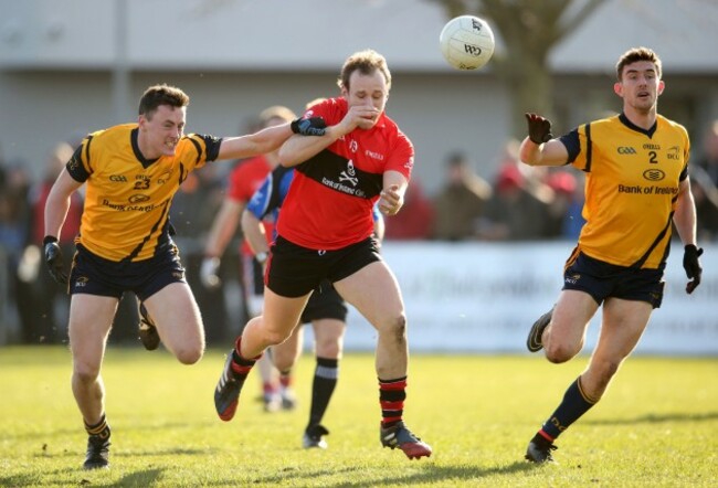 Brian O'Driscoll is tackled by Diarmuid O'Connor and Colm Begley