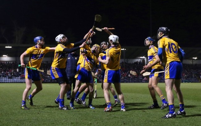 Clare players go through a warm up drill