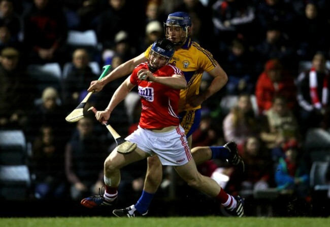 Conor Lehane is tackled by Conor Ryan