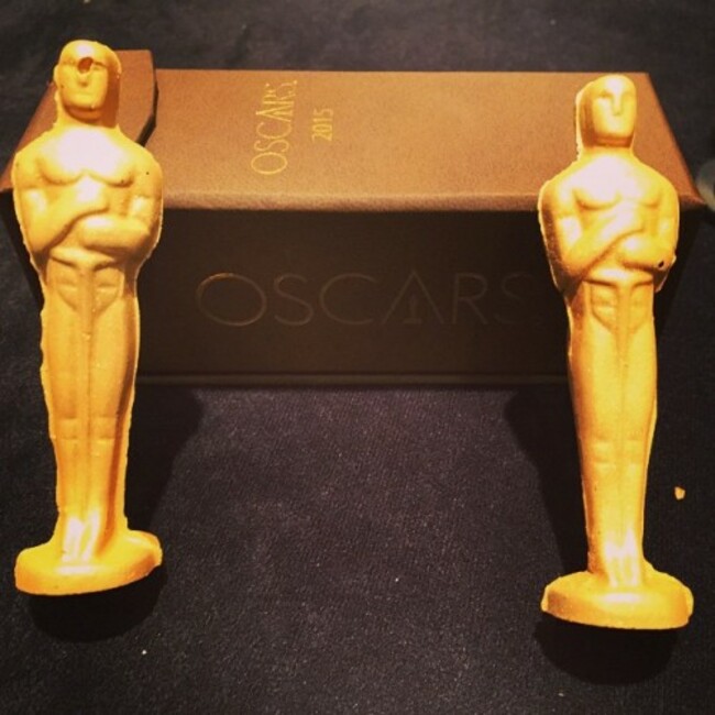 Some guests of the Governors Ball will go home with a gold-dusted Oscar-shaped chocolate inside this specially designed box. #oscars #wolfgangpuck #nomnomnom