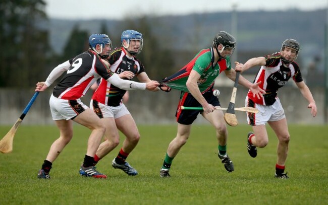 Joe Campion under pressure from Ian Byrne, Will Young and Aidan Fogarty