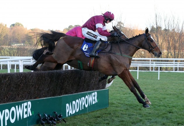 Bryan Cooper onboard Don Poli clears the last fence on his way to winning