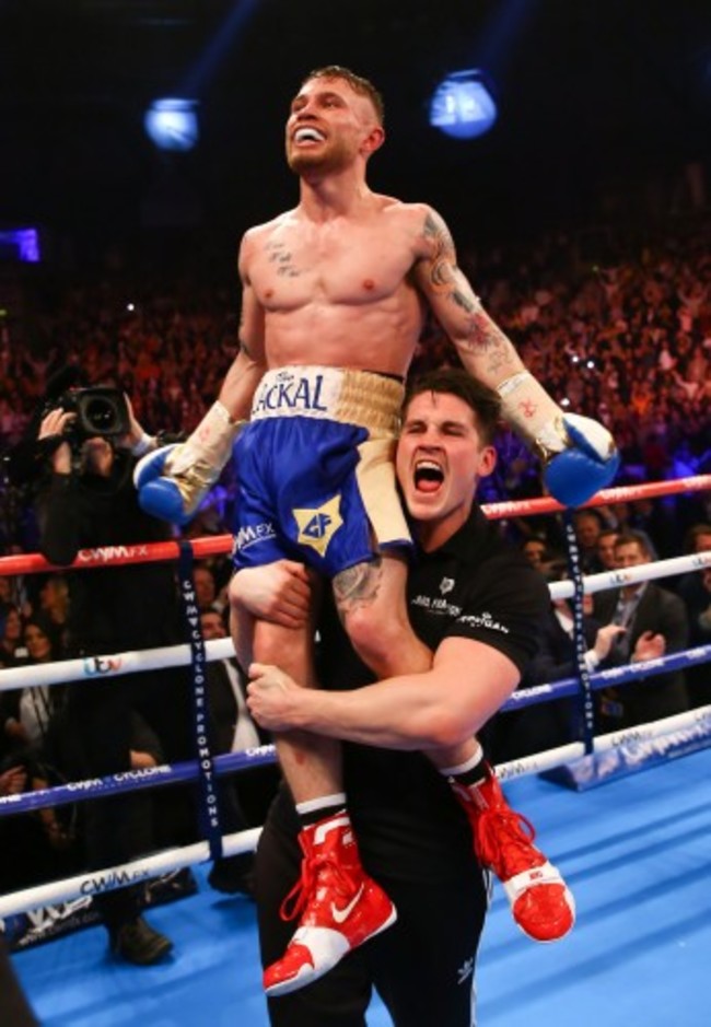 Carl Frampton celebrates winning with Shane McGuigan