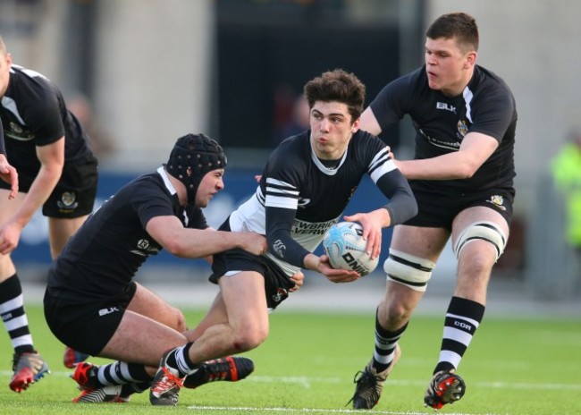 Eoghan Maher and Brian Diffley tackle Jimmy O'Brien