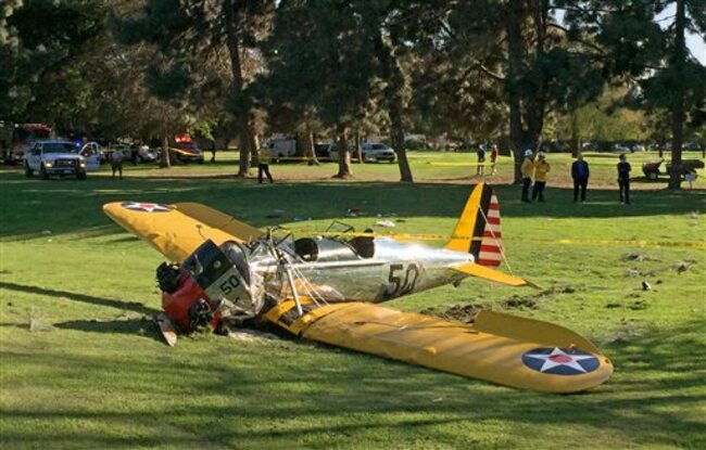 APTOPIX Golf Course Plane Crash