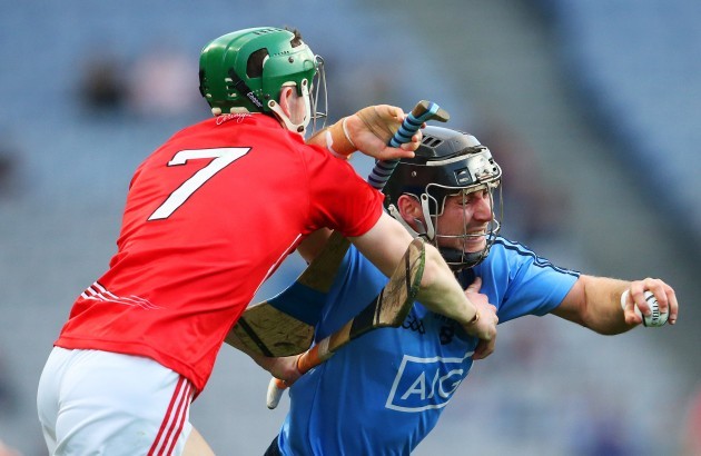Shane Durkin is tackled by Cormac Murphy