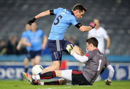 Niall Morgan saves a shot from Nicky Devereux